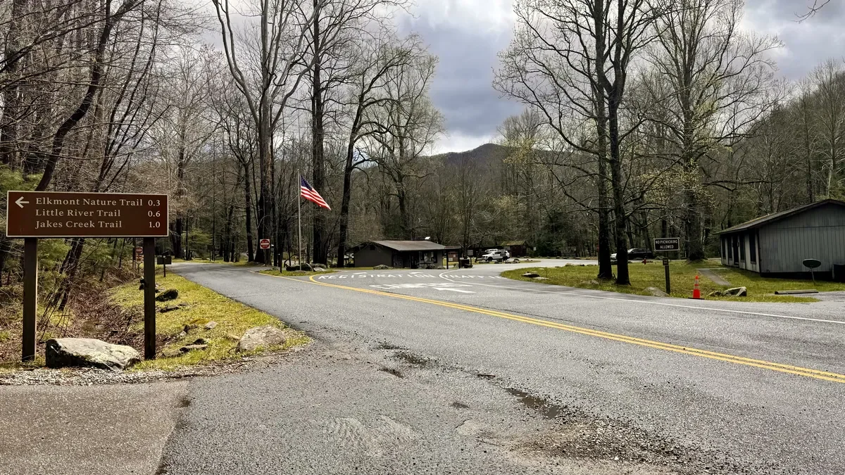 entrance to a campground where the road splits