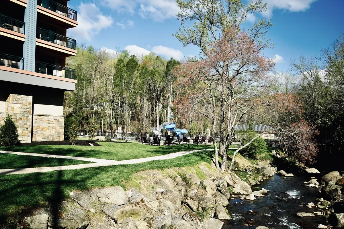 outdoor area with creek Embassy Suites in Gatlinburg