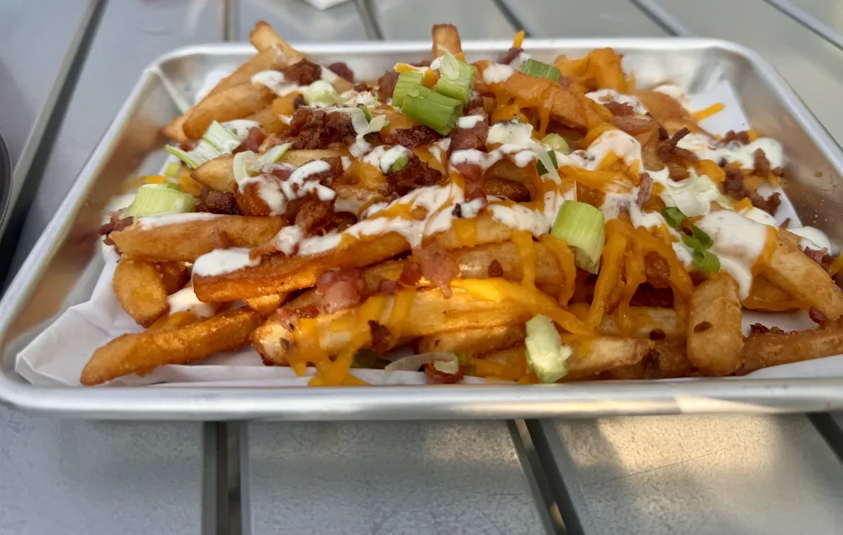 fries with cheese, onions, bacon