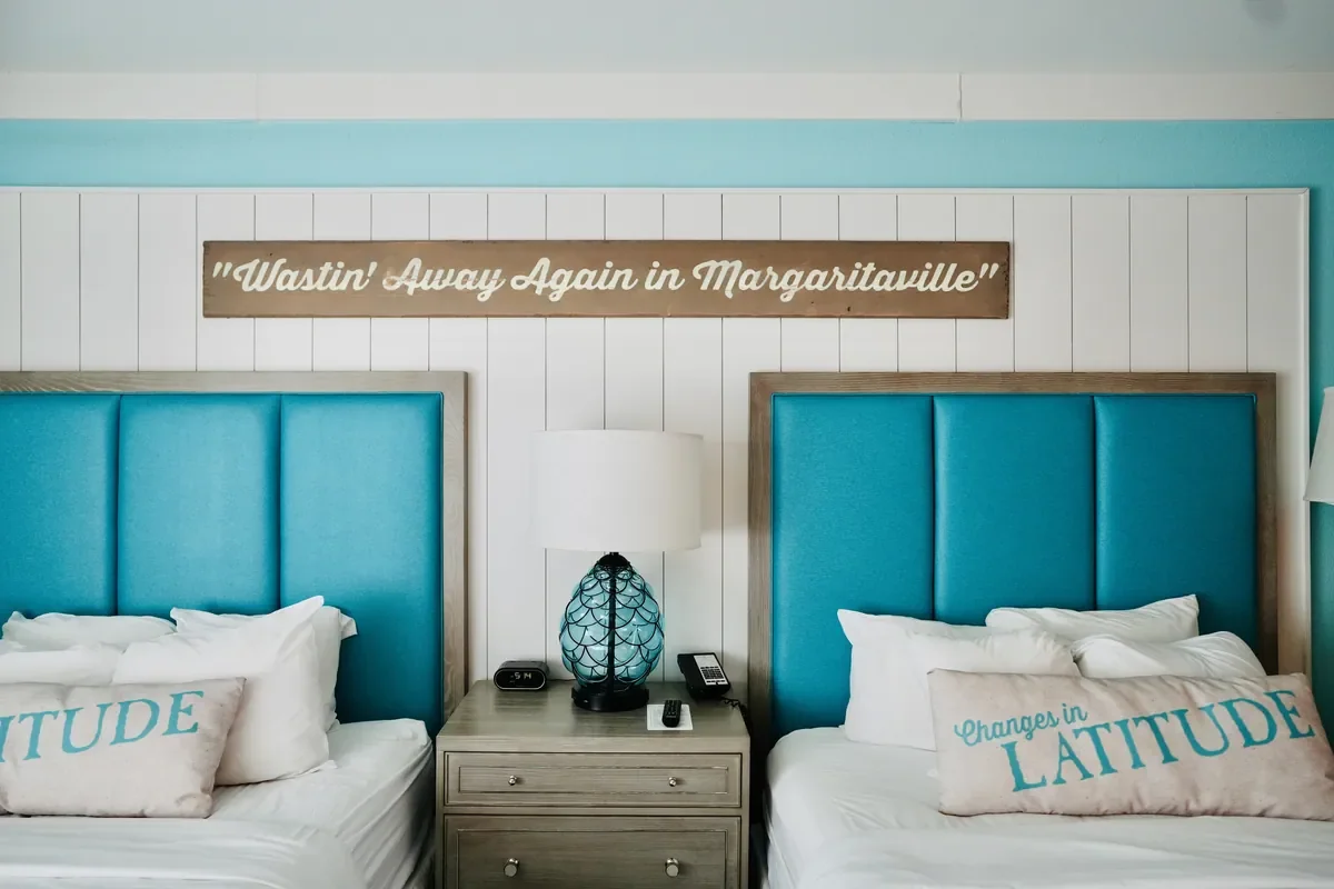 room view in hotel of two beds at margaritaville with sland decor