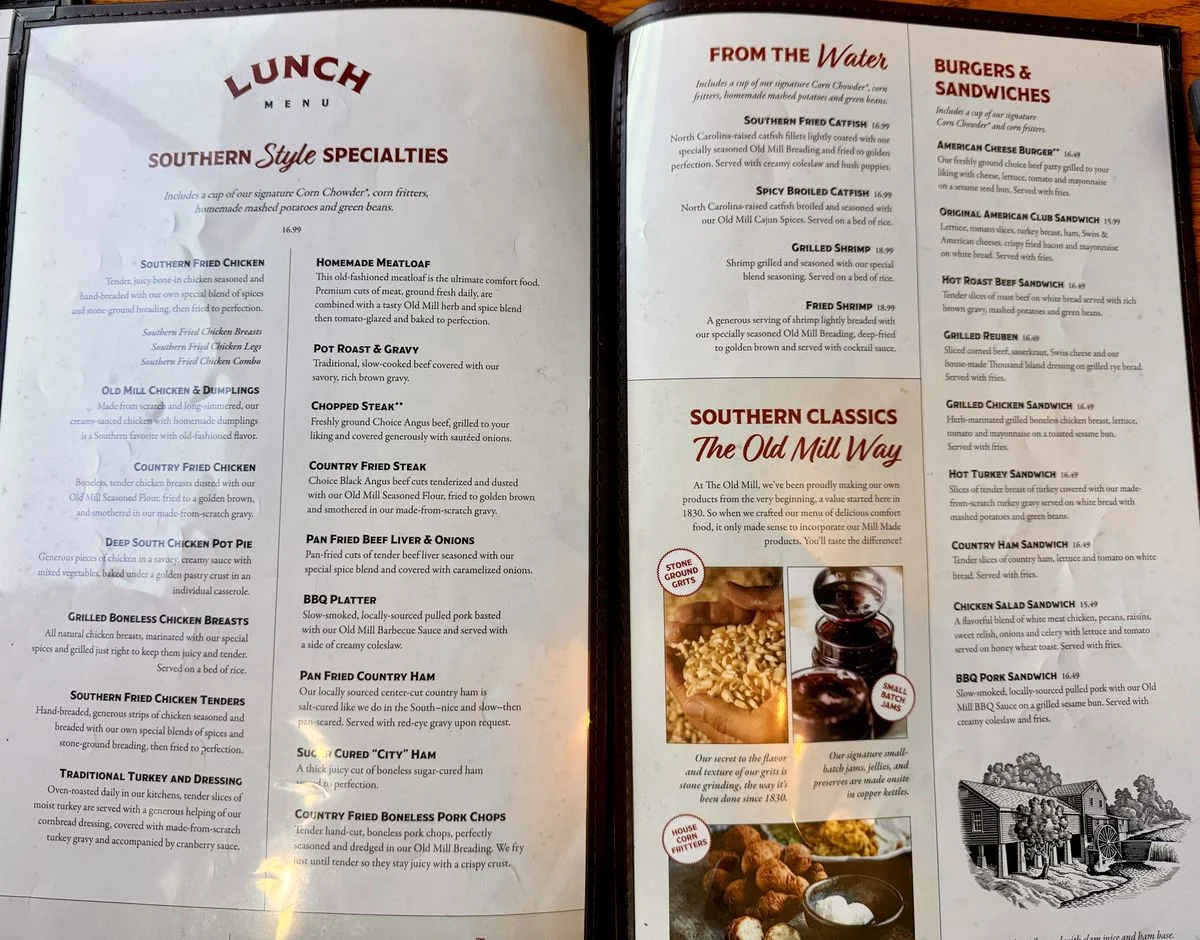 The Old Mill Restaurant menu on a table