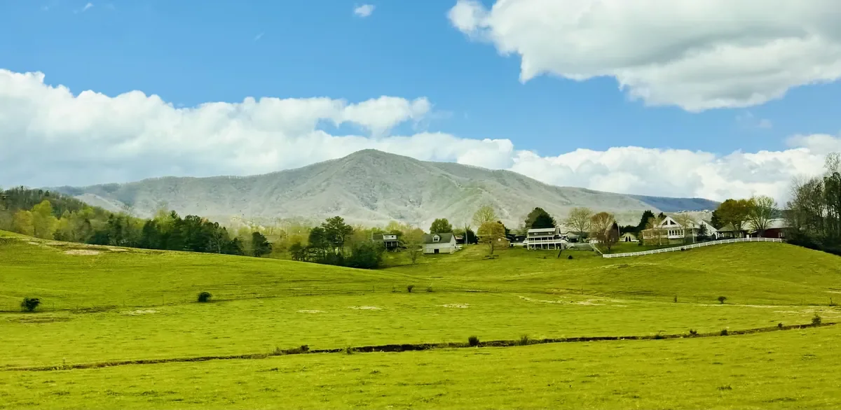 wears valley view of fields and mountains