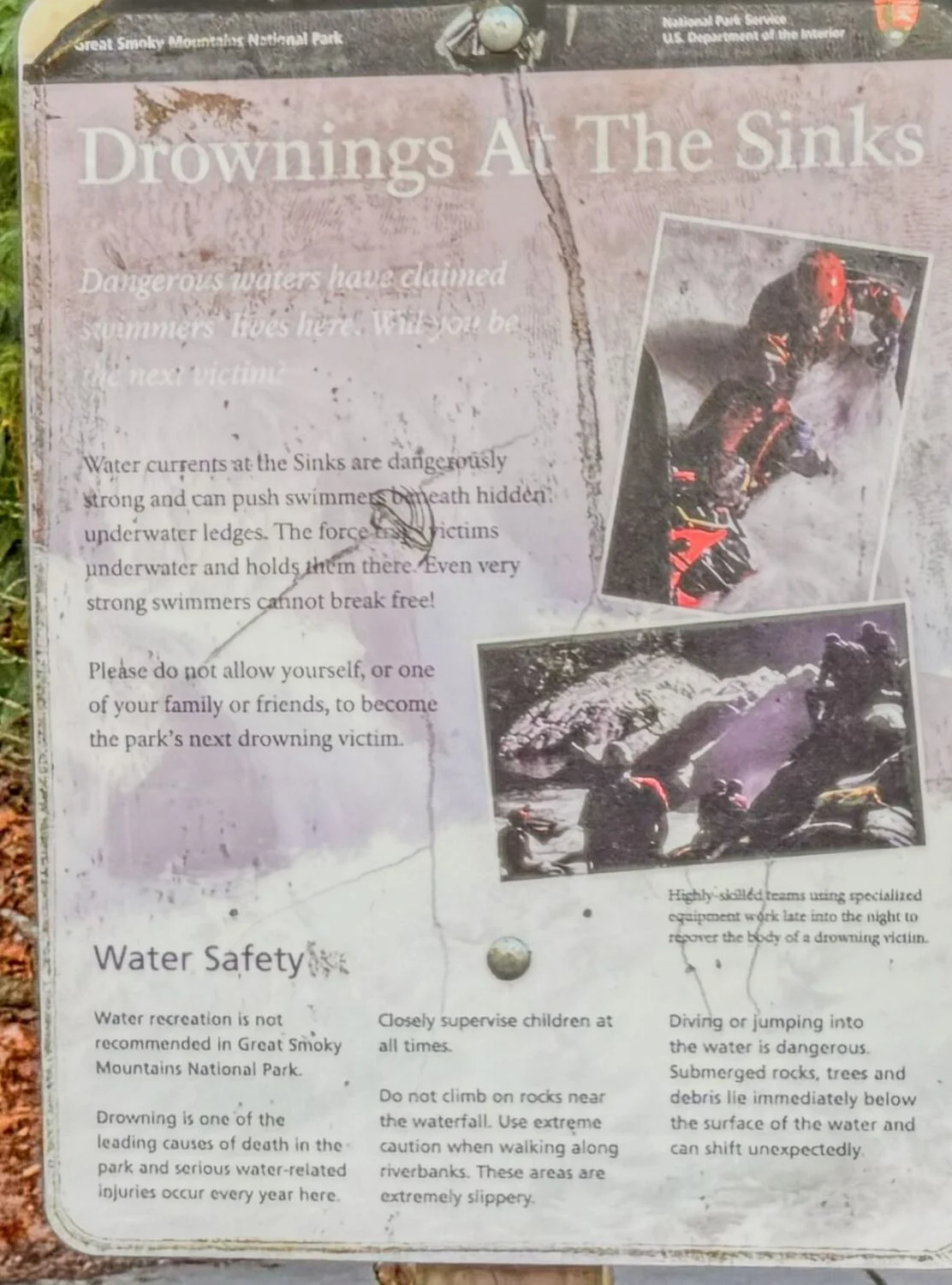 sign at the sinks waterfall warning of drownings