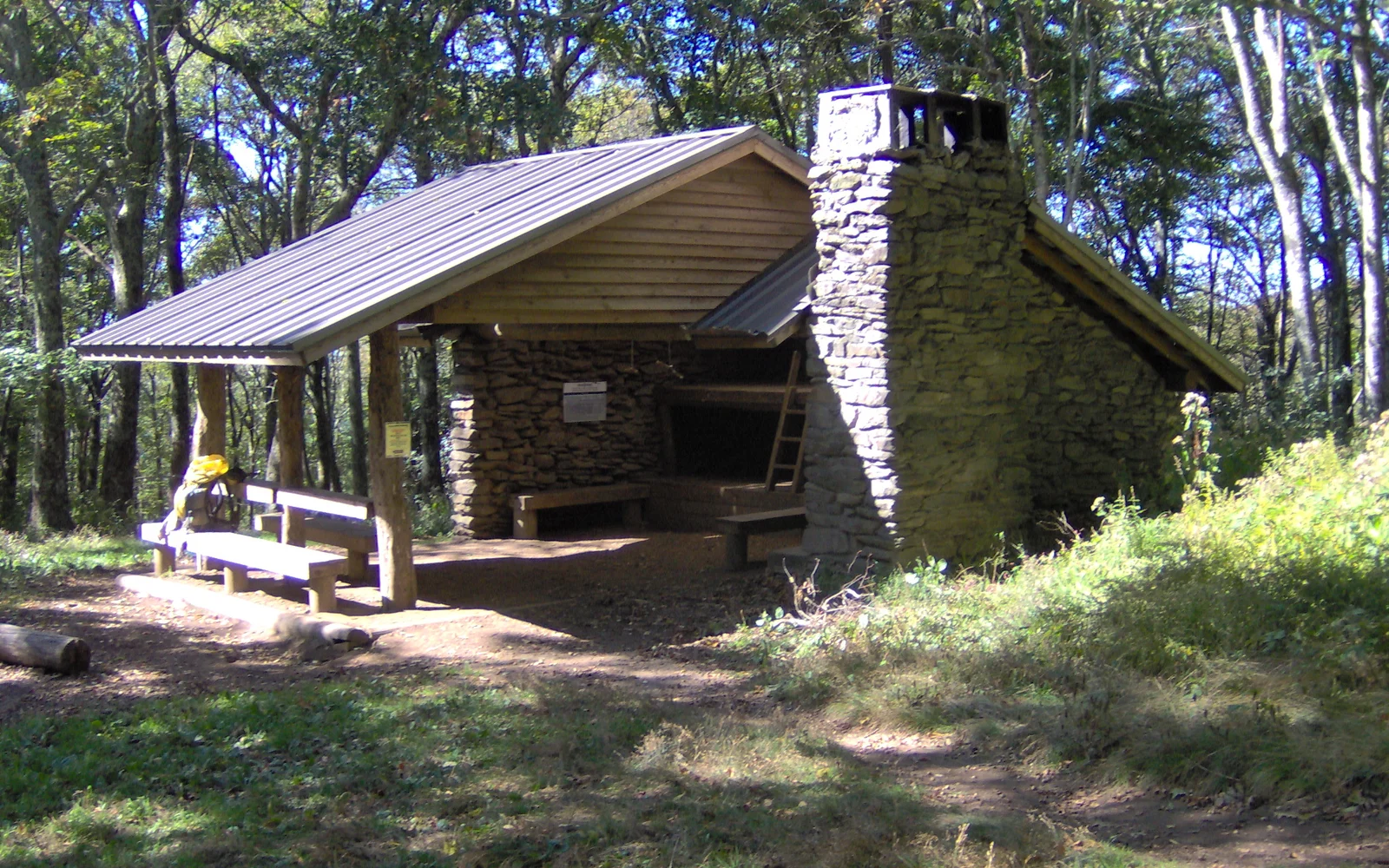 The stone and timber Spence Field Shelter near the Appalachian Trail and Eagle Creek Trail junction