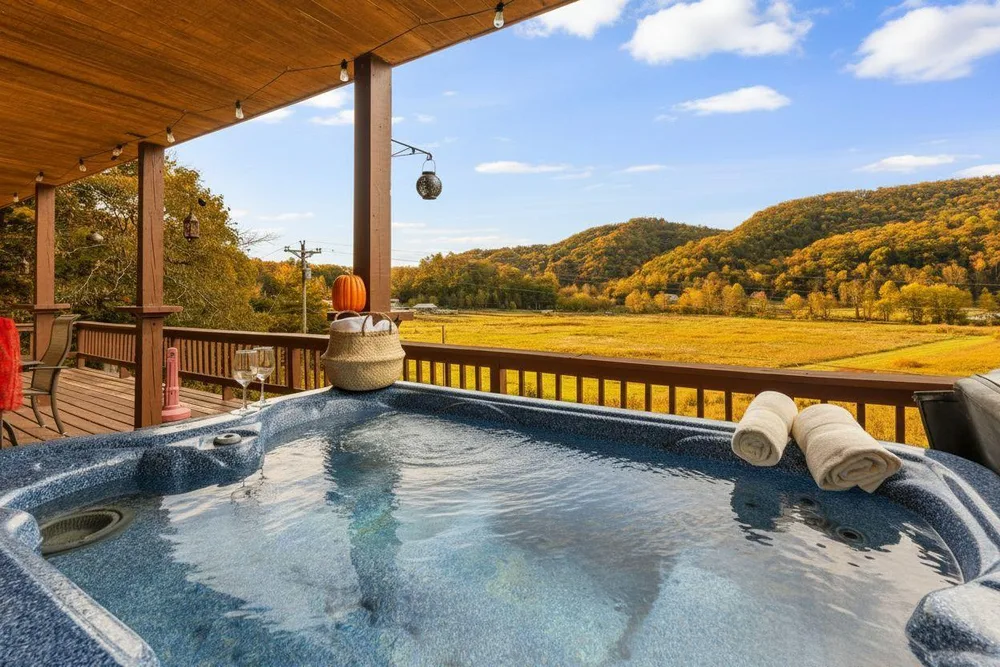 Hot tub overlooking scenic autumn landscape