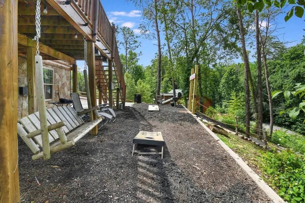 Outdoor swings and wooded surroundings