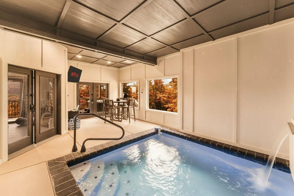 Indoor pool with views of nature