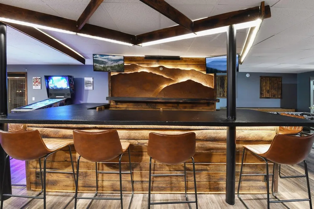 Modern bar area with seating and decor