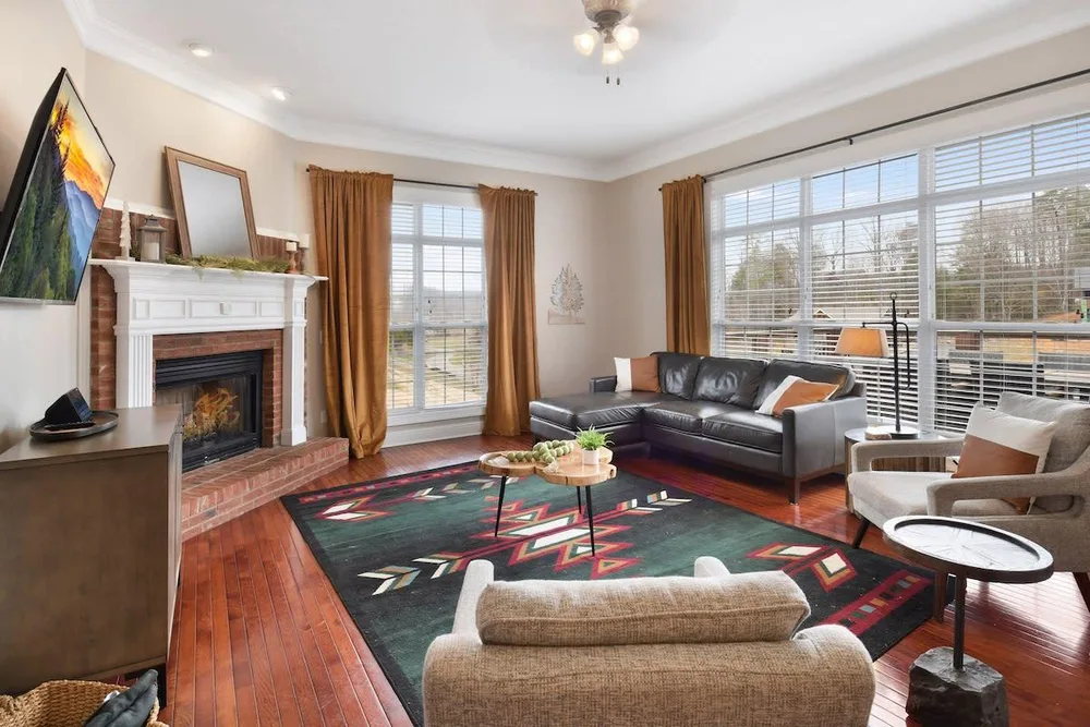 Cozy living room with fireplace and windows