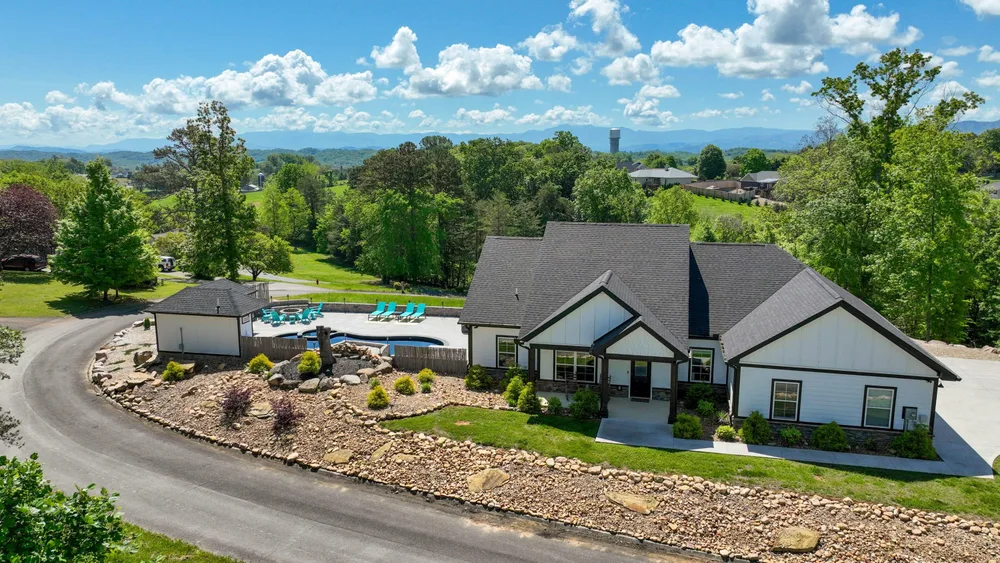 Modern cabin with swimming pool and lawn