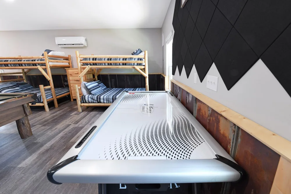 Bunk beds and air hockey table