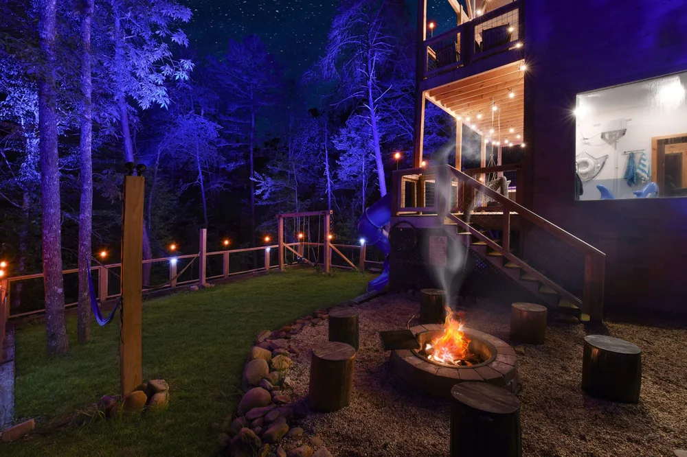 Fire pit area in wooded cabin retreat
