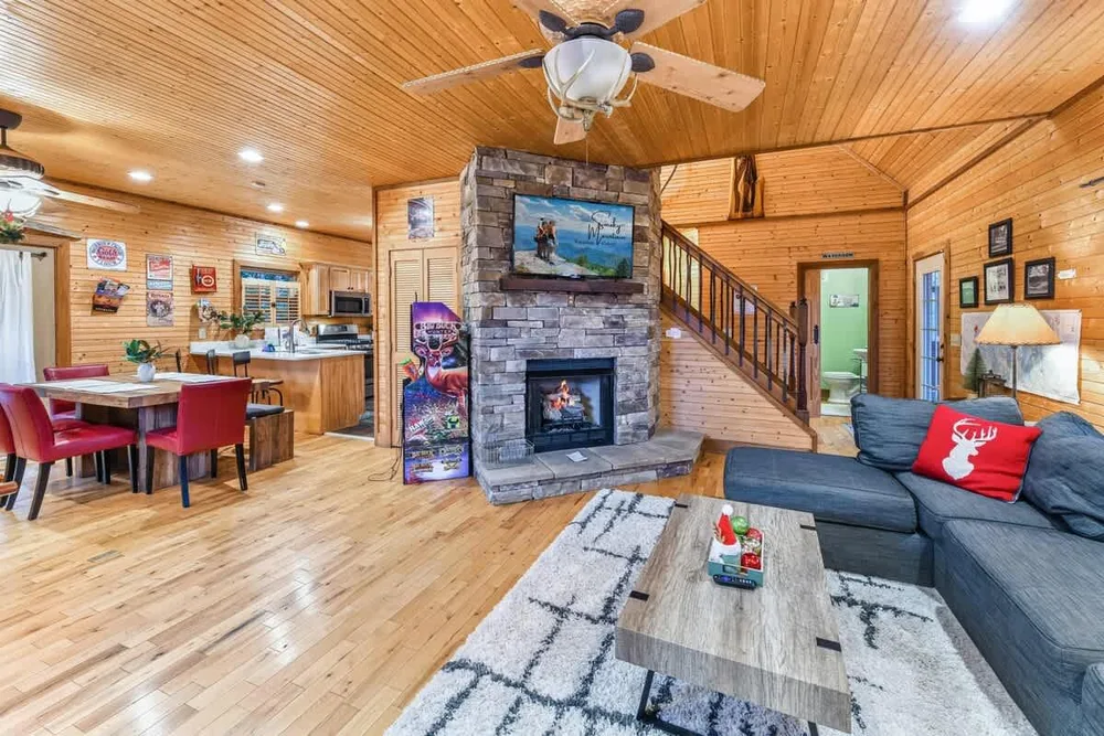 Cozy living area with stone fireplace