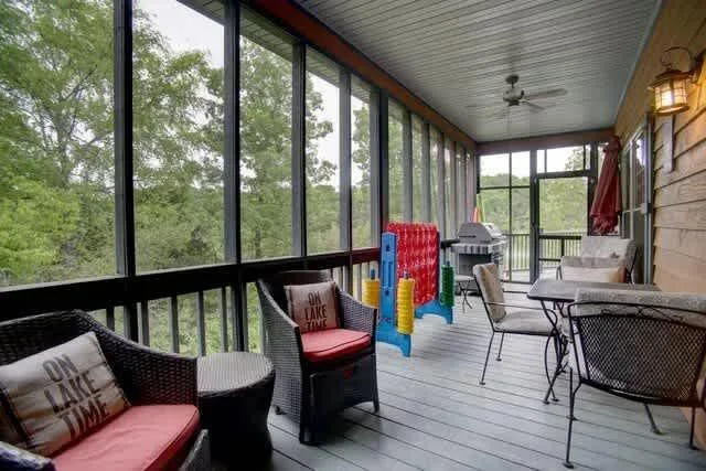 Screened porch with seating and play area