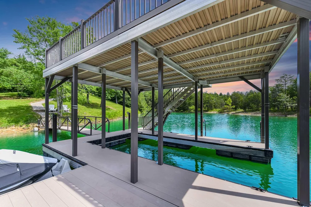 Boat dock by clear blue lake