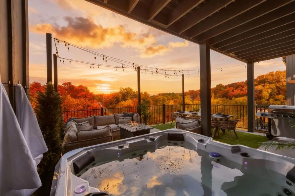 Hot tub with sunset view and seating