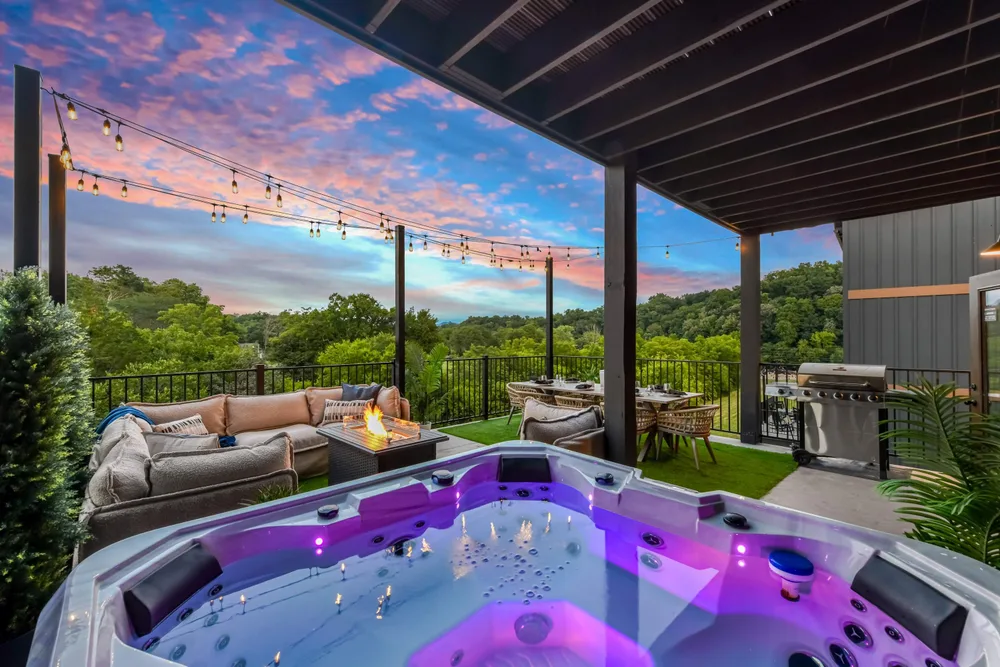 Hot tub with sunset view on patio