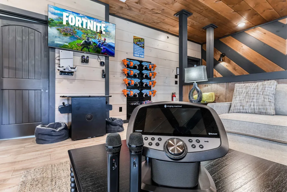 Game room with Fortnite setup and karaoke