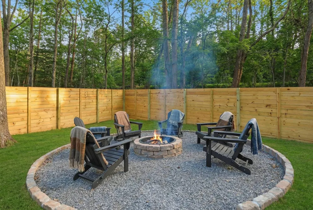 Fire pit area surrounded by seating