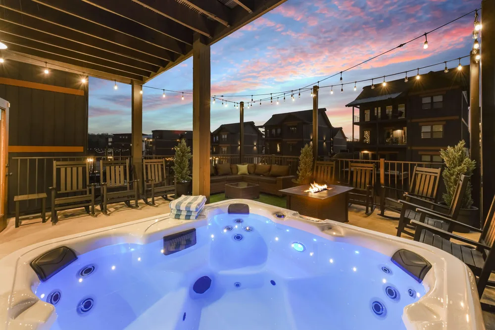 Hot tub on deck with sunset view