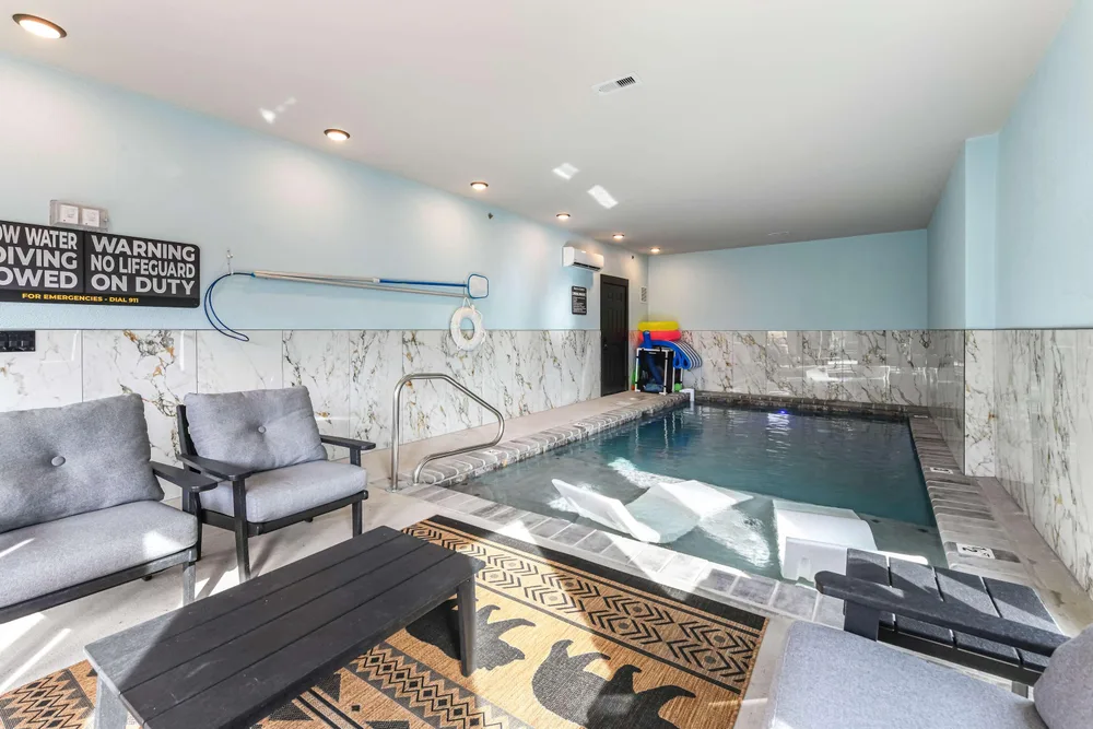 Indoor pool with seating area