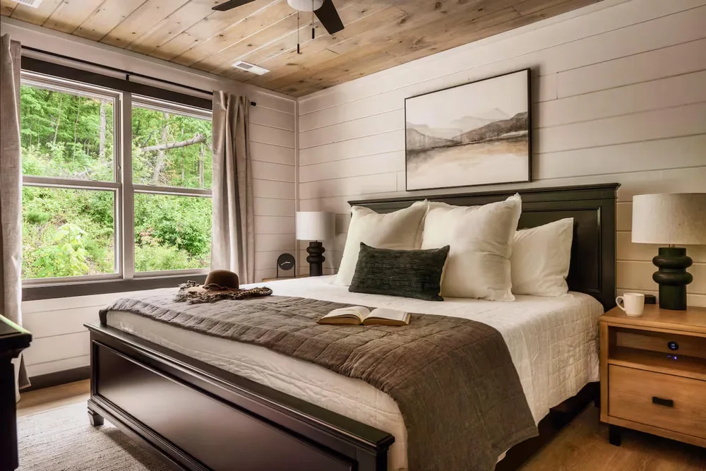 Cozy bedroom with natural light windows
