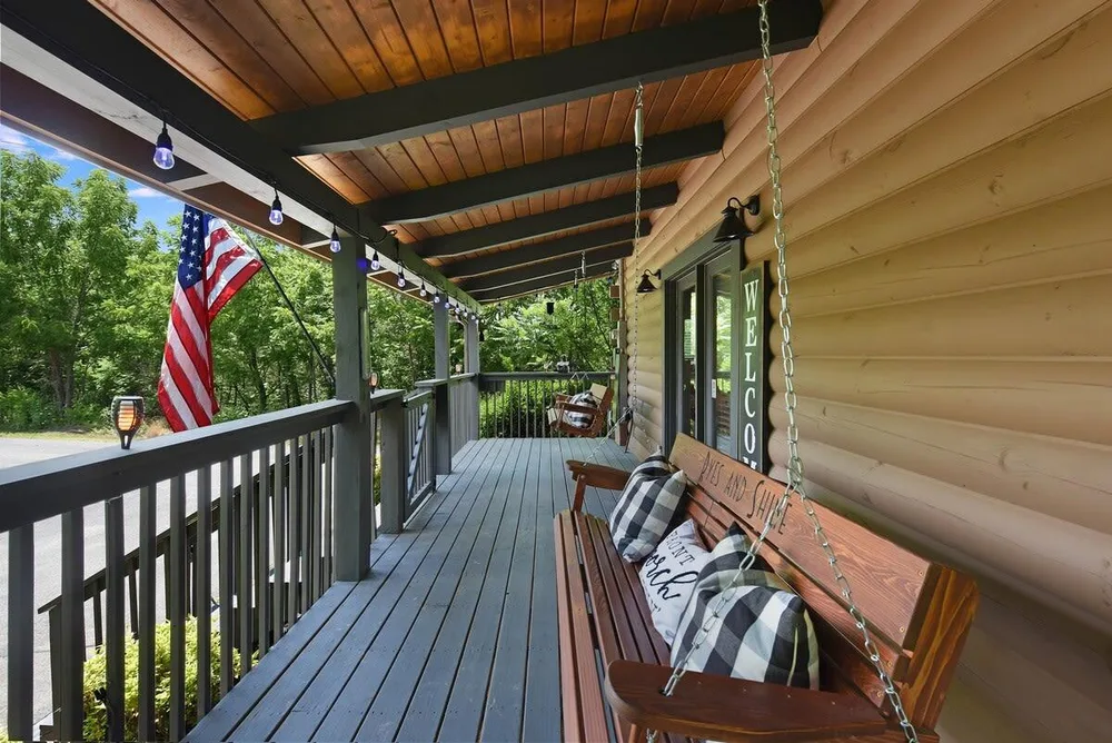 Front porch with swinging bench seating