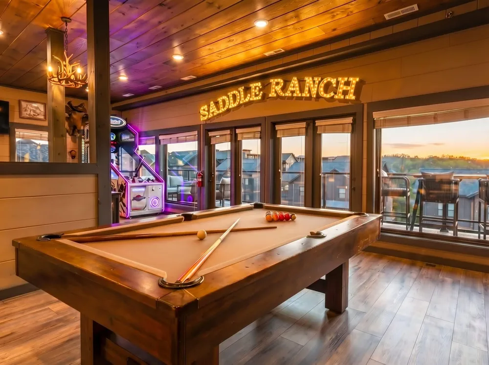 Saddle Ranch game room with pool table