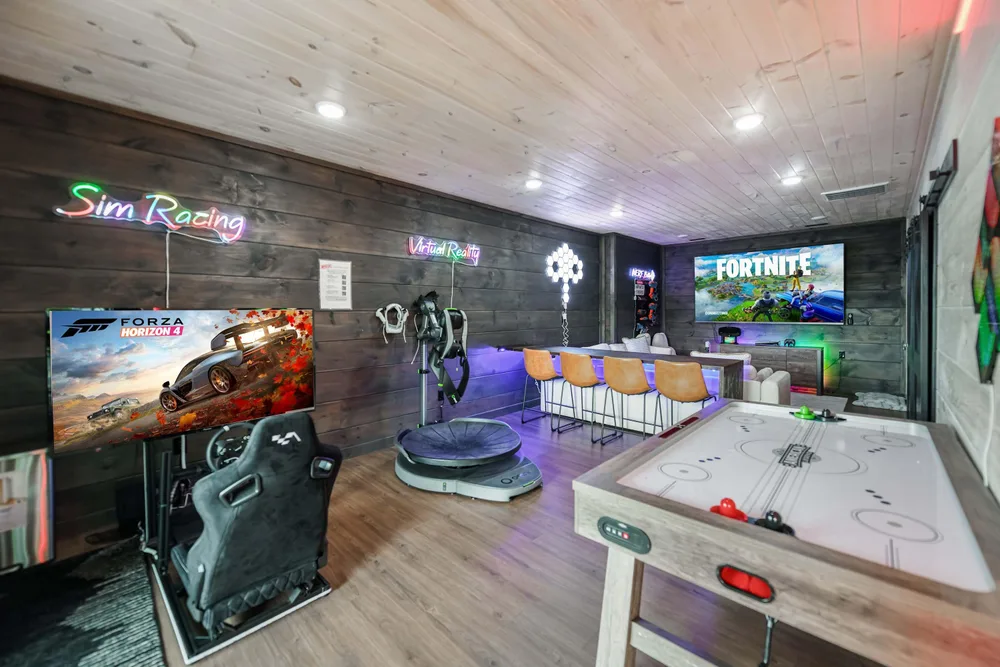 Game room with racing and gaming setups