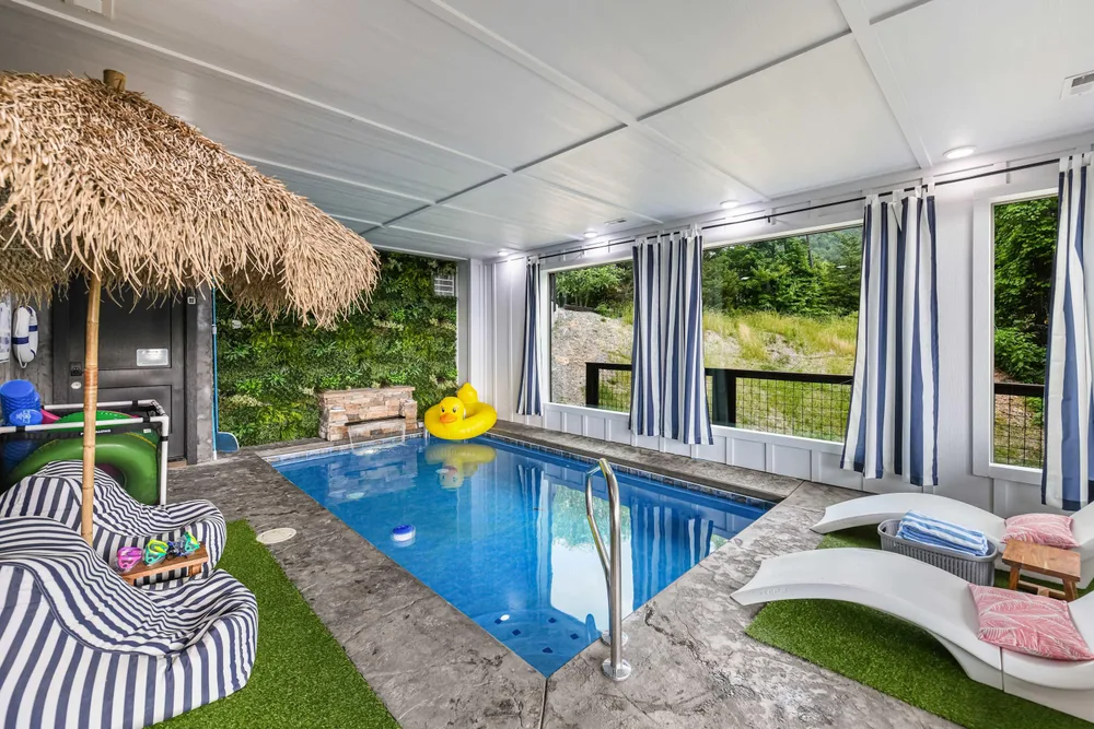 Indoor pool area with lounging space