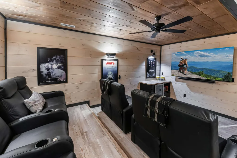 Home theater with reclining seats and TV