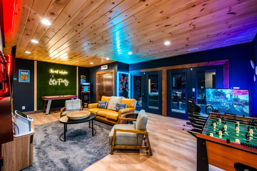 Game room with seating and entertainment options