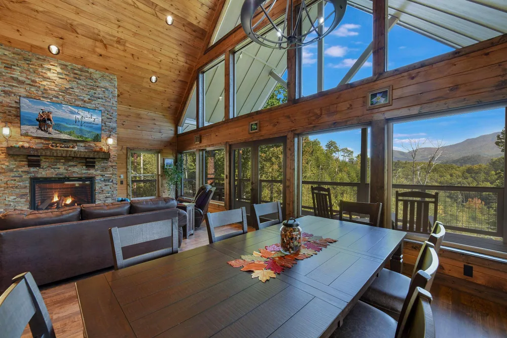 Spacious cabin interior with mountain view