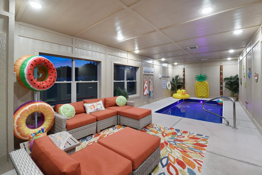 Indoor lounge area with small pool