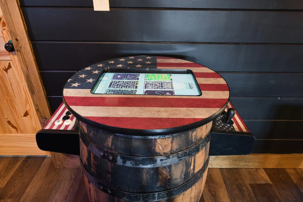 Interactive touchscreen gaming table with American flag